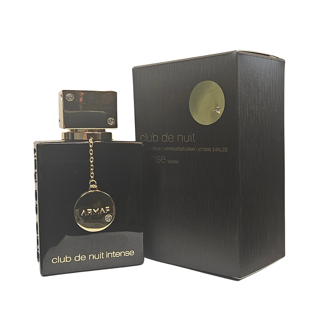 Club de Nuit Intense Woman by Armaf 105 ml perfume bottle next to the box on white background