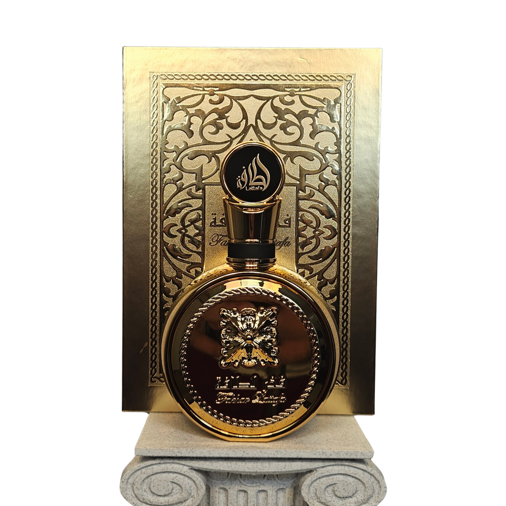Fakhar Lattafa Extrait eau de parfum 100 ml perfume bottle and box on white background