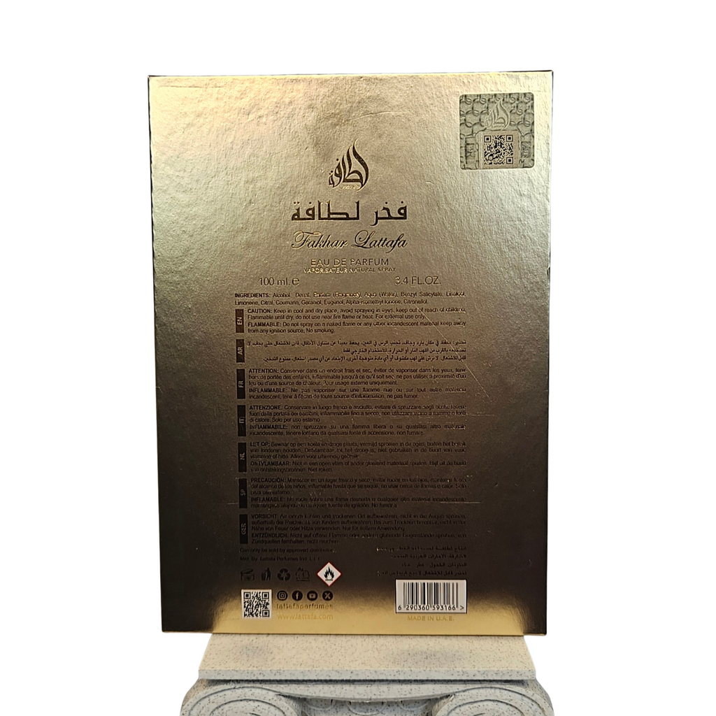 Fakhar Lattafa Extrait eau de parfum 100 ml back of perfume box on white background with lattafa seal
